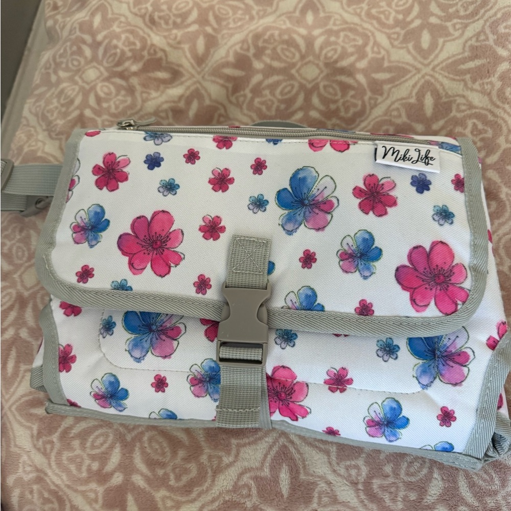 Colorful Floral changing pad with storage